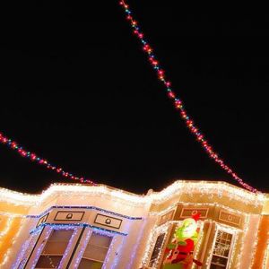 Christmas lights adorn the row houses 