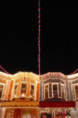 Christmas lights adorn the row houses 